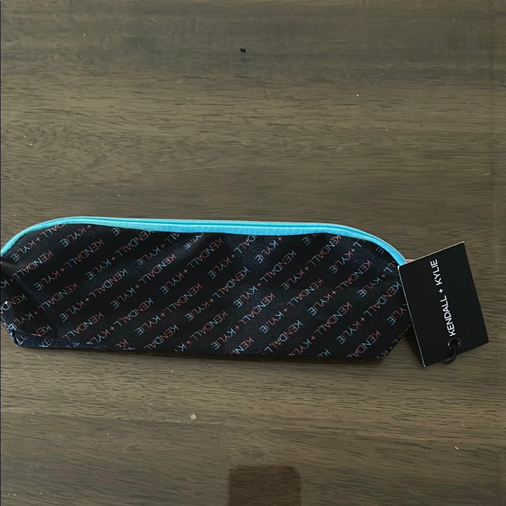 Kendall & Kylie Black and Blue Toiletry Bag with Diagonal Stripe Pattern